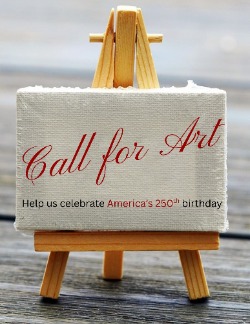 A wooden art easel with a white canvas that reads 'Call for Art. Help us celebrate America's 250th birthday.'