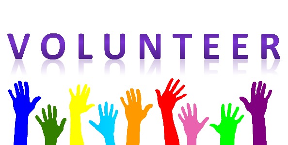 Purple text saying "Volunteer" above a row of raised hands in different colors, indicating volunteering to help.