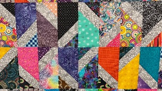 Sample of handmade quilt with algorithm pattern, multicolored